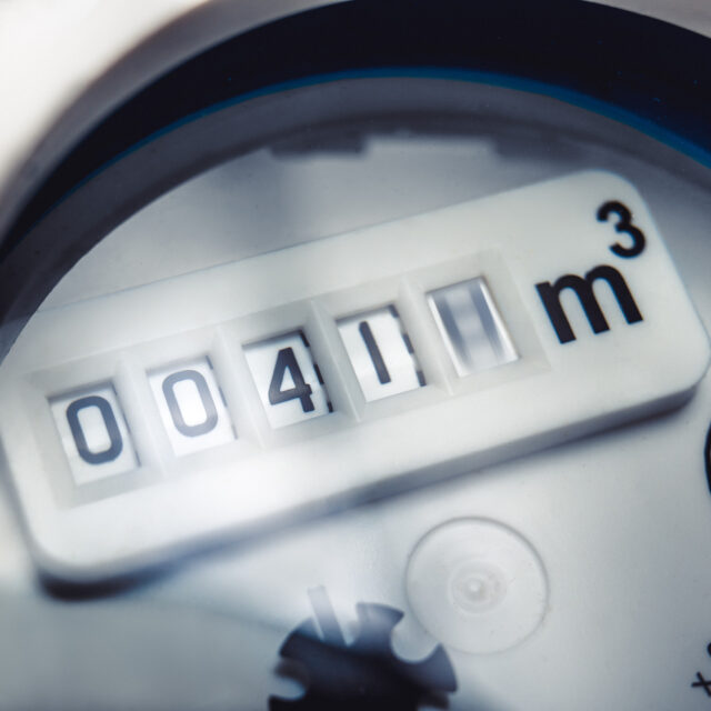 Close-up of a water meter displaying a reading of 041 cubic meters.