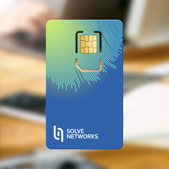 A blue smart card with a gold chip, featuring the Solve Networks logo and design. The background is blurred.
