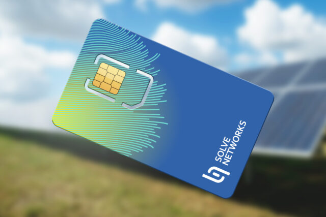 A blue card with a yellow chip, labeled "SOLVE NETWORKS," is shown with a blurred background featuring a solar panel and sky.