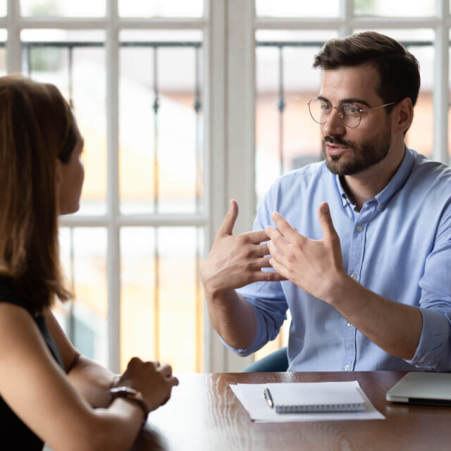 Two people in a meeting