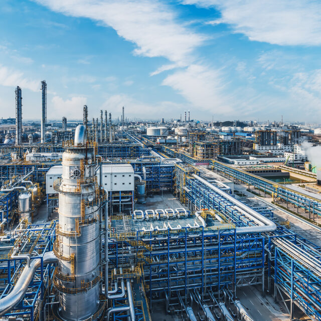 Oil refineries and chemical plants in industrial areas in summer